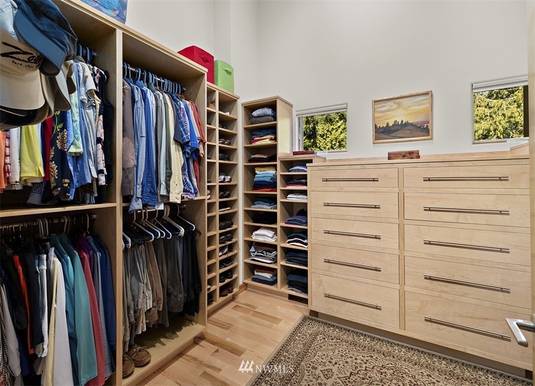4731 Weber Road Snohomish, WA 98290 - Photo 23 of 40 a view of walk in closet with clothes and shoes