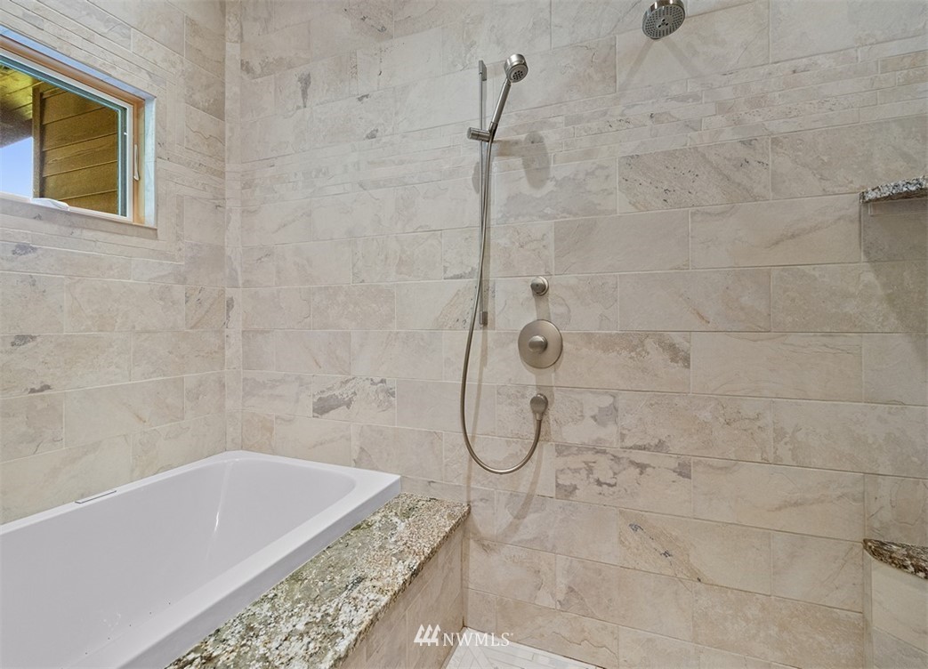 4731 Weber Road Snohomish, WA 98290 - Photo 25 of 40 a bathroom with a bath tub and shower