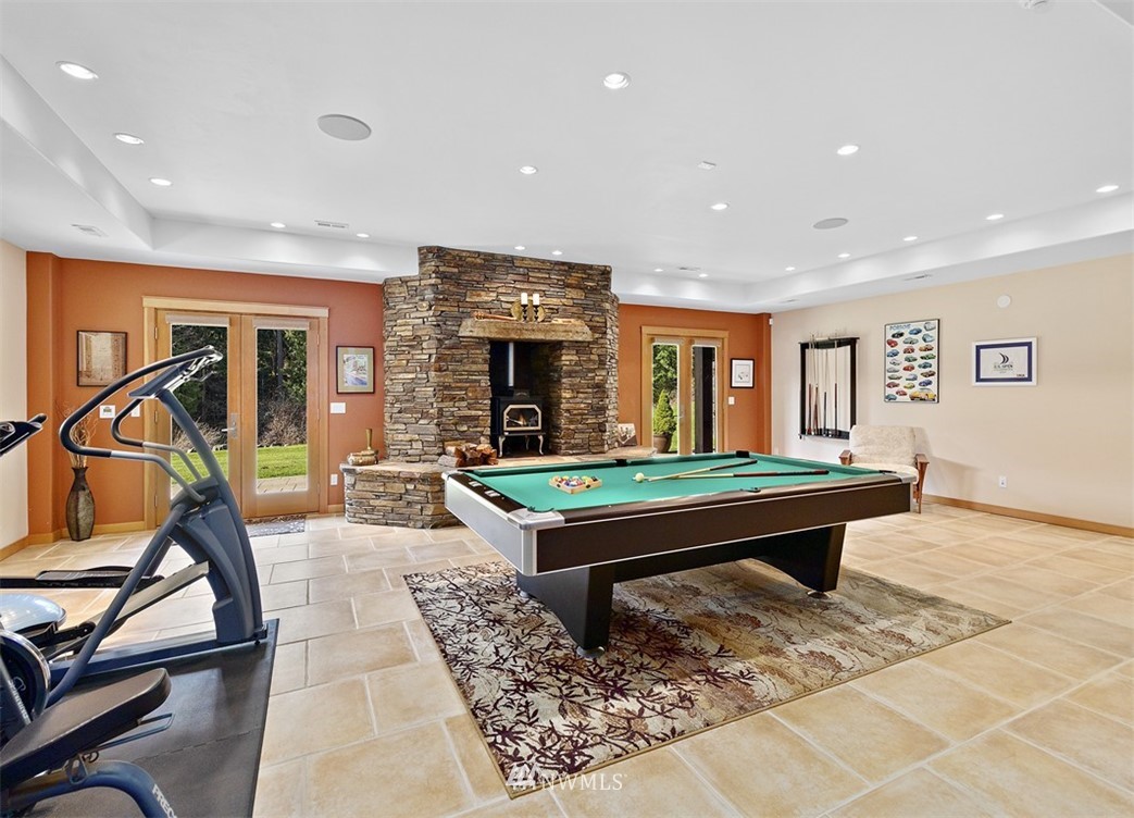 4731 Weber Road Snohomish, WA 98290 - Photo 28 of 40 a room with pool tables and a rug