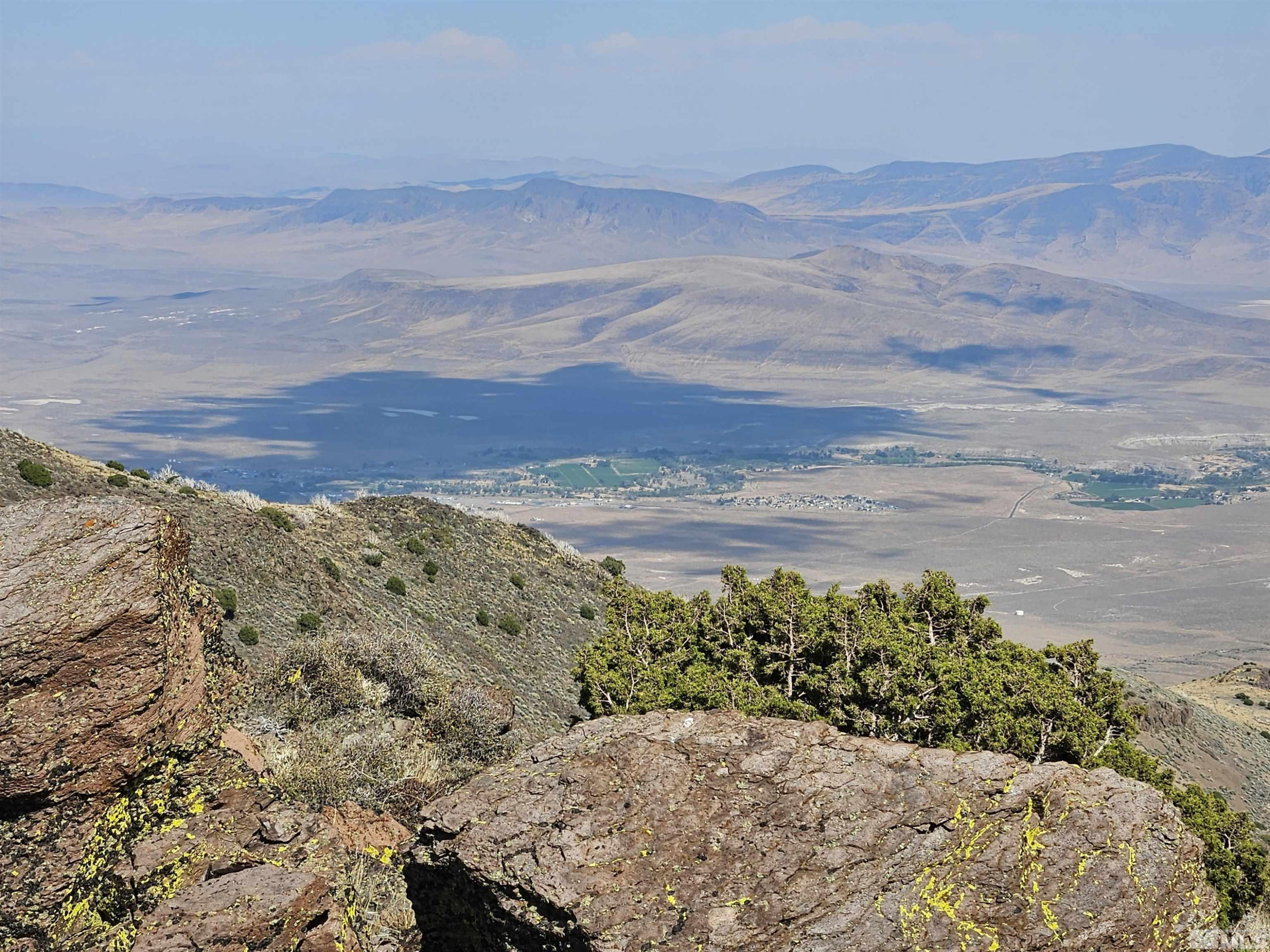 80 Rodero Road Reno, NV 89510 - Photo 10 of 12 a view of a dry yard with wooden floor and fence