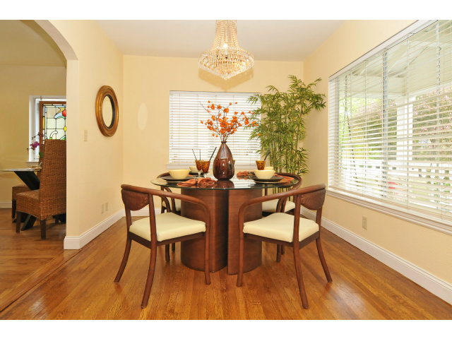 109 Bloomfield Road Burlingame, CA 94010 - Photo 6 of 15 a view of a dining room with furniture and a large window
