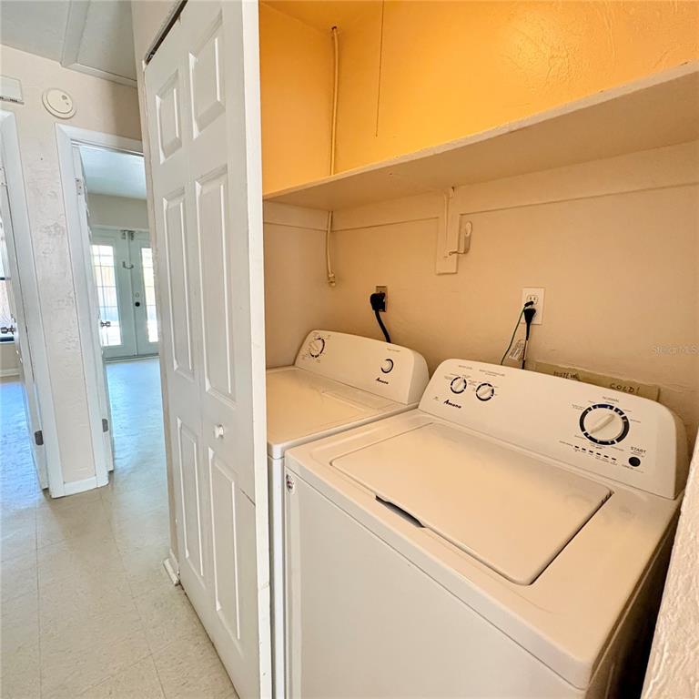 7011 Southwest 17th Place Gainesville, FL 32607 - Photo 11 of 22 a utility room with dryer and washer