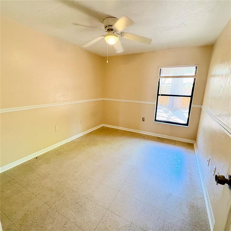 7011 Southwest 17th Place Gainesville, FL 32607 - Photo 13 of 22 an empty room with a bathroom