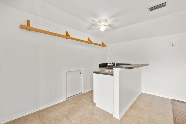 a view of storage and utility room with washer and dryer