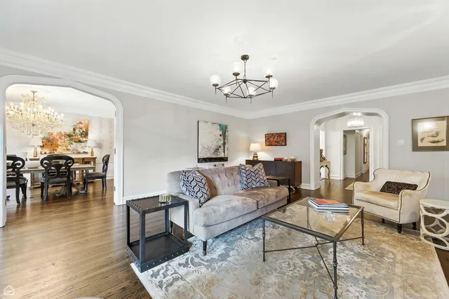 a living room with furniture or couch and a dining table