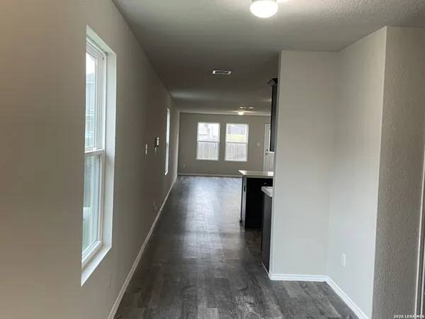 a view of gallery with windows