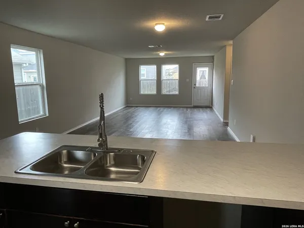 a view of kitchen and sink