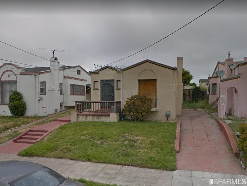 2135 7th Avenue Oakland, CA 94606 - Photo 1 of 10 a front view of a house with a garden and yard