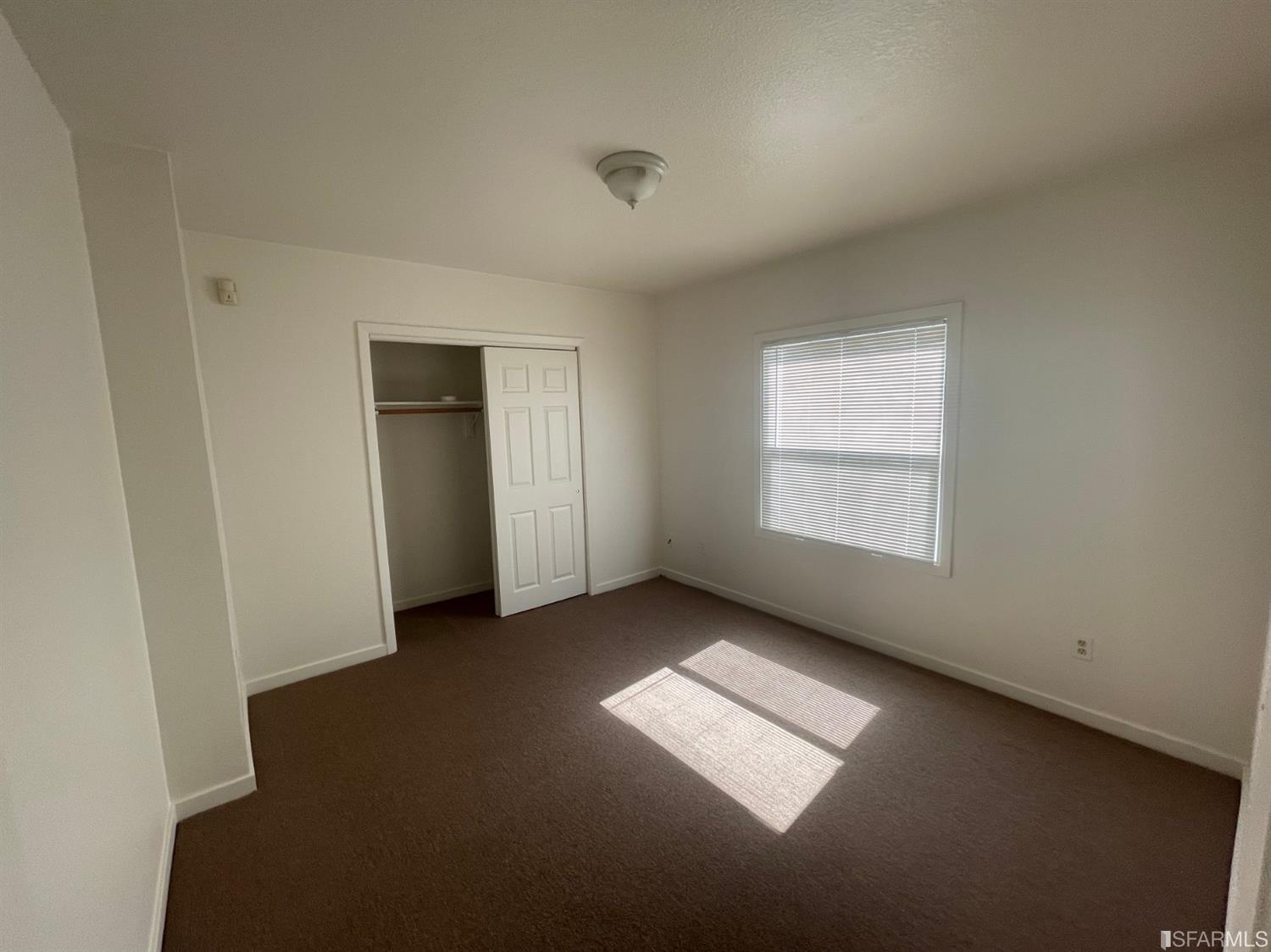 2135 7th Avenue Oakland, CA 94606 - Photo 8 of 10 an empty room with windows