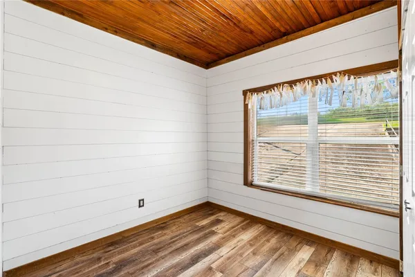 a view of a room with a large window