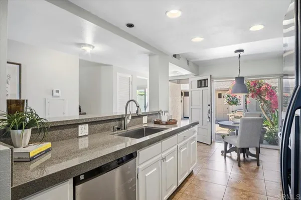 a spacious bathroom with a sink double vanity and a mirror
