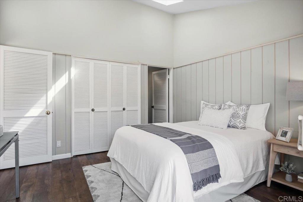 213 Via Osuna Rancho Santa Fe, CA 92091 - Photo 22 of 58 a spacious bedroom with a bed and a shower