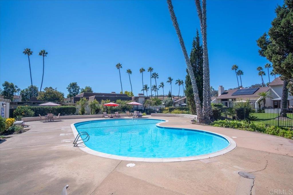 213 Via Osuna Rancho Santa Fe, CA 92091 - Photo 58 of 58 a view of a swimming pool with a yard