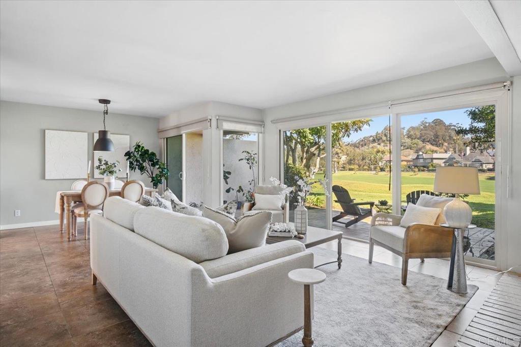 213 Via Osuna Rancho Santa Fe, CA 92091 - Photo 6 of 58 a living room with furniture and a large window