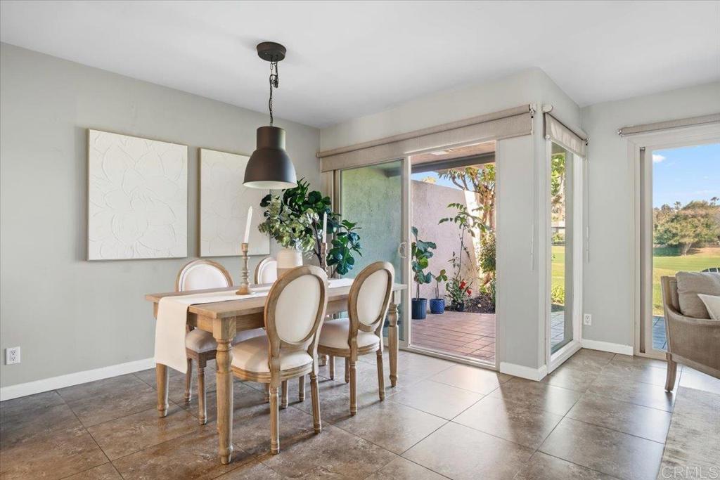 213 Via Osuna Rancho Santa Fe, CA 92091 - Photo 7 of 58 a dining room with furniture and window