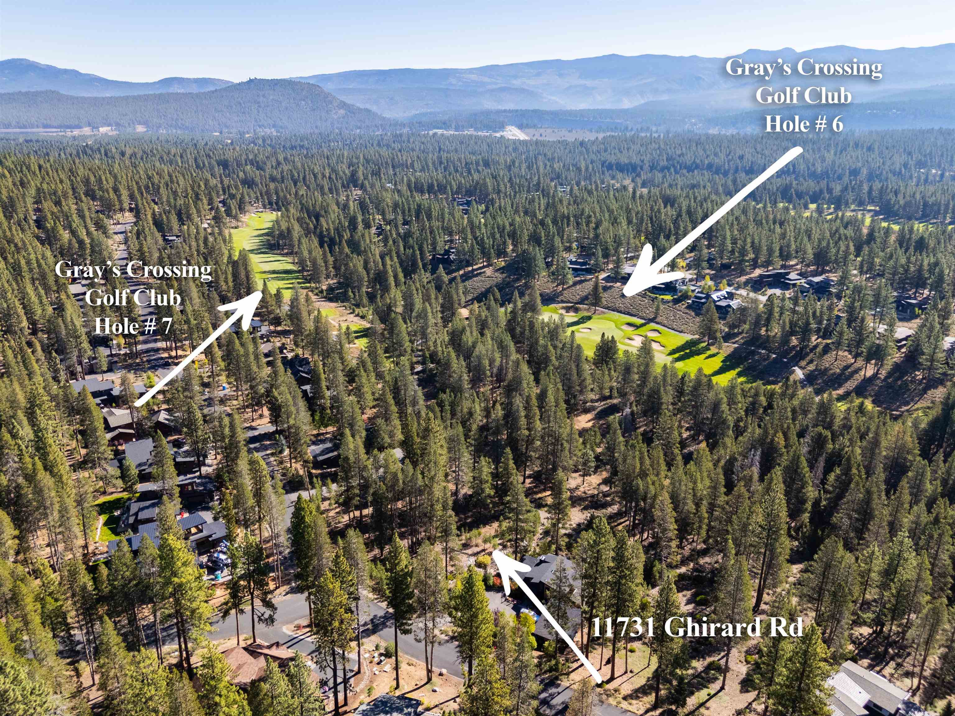 11731 Ghirard Road Truckee, CA 96161 - Photo 3 of 23 a view of a city with mountains in the background