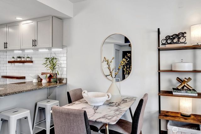a view of a dining room with furniture