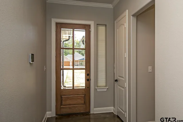 a view of wooden floor and closet