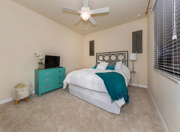 a bathroom with a sink a toilet and bathtub
