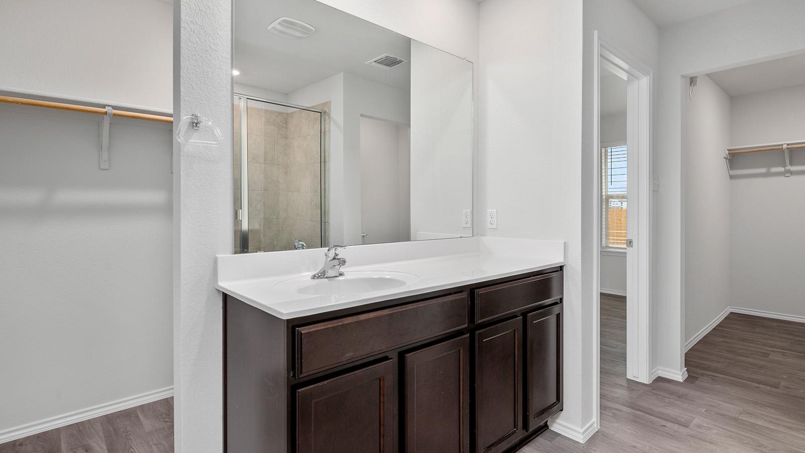 1417 Victory Rnch Trail Killeen, TX 76549 - Photo 11 of 22 Modern vanity and ample closet space define this well-appointed primary bathroom.