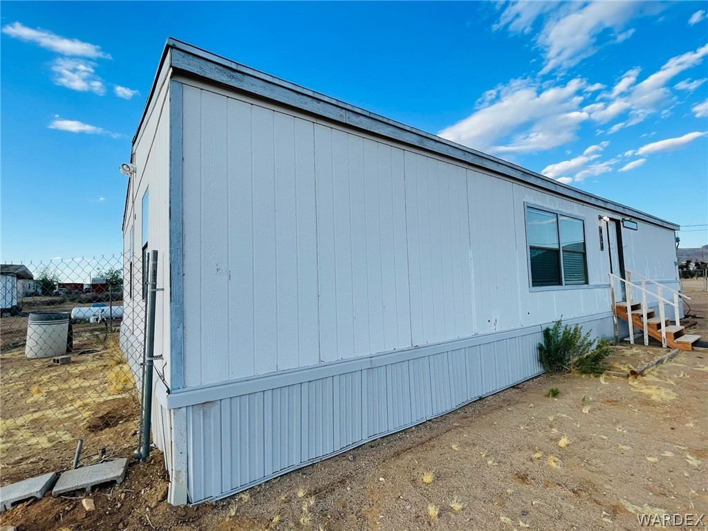 458 South Hope Road Golden Valley, AZ 86413 - Photo 8 of 27 a backyard of a house