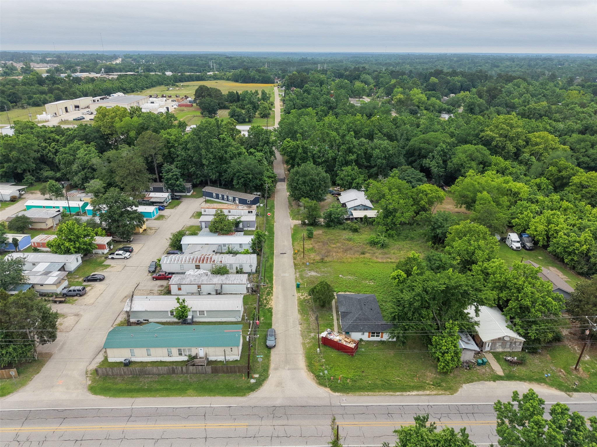 0 Mill Street Willis, TX 77378 - Photo 20 of 24 a view of a city with tall buildings