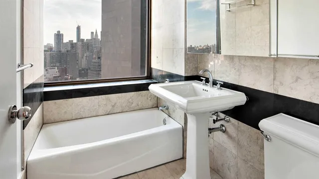 a bathroom with a sink and a bathtub