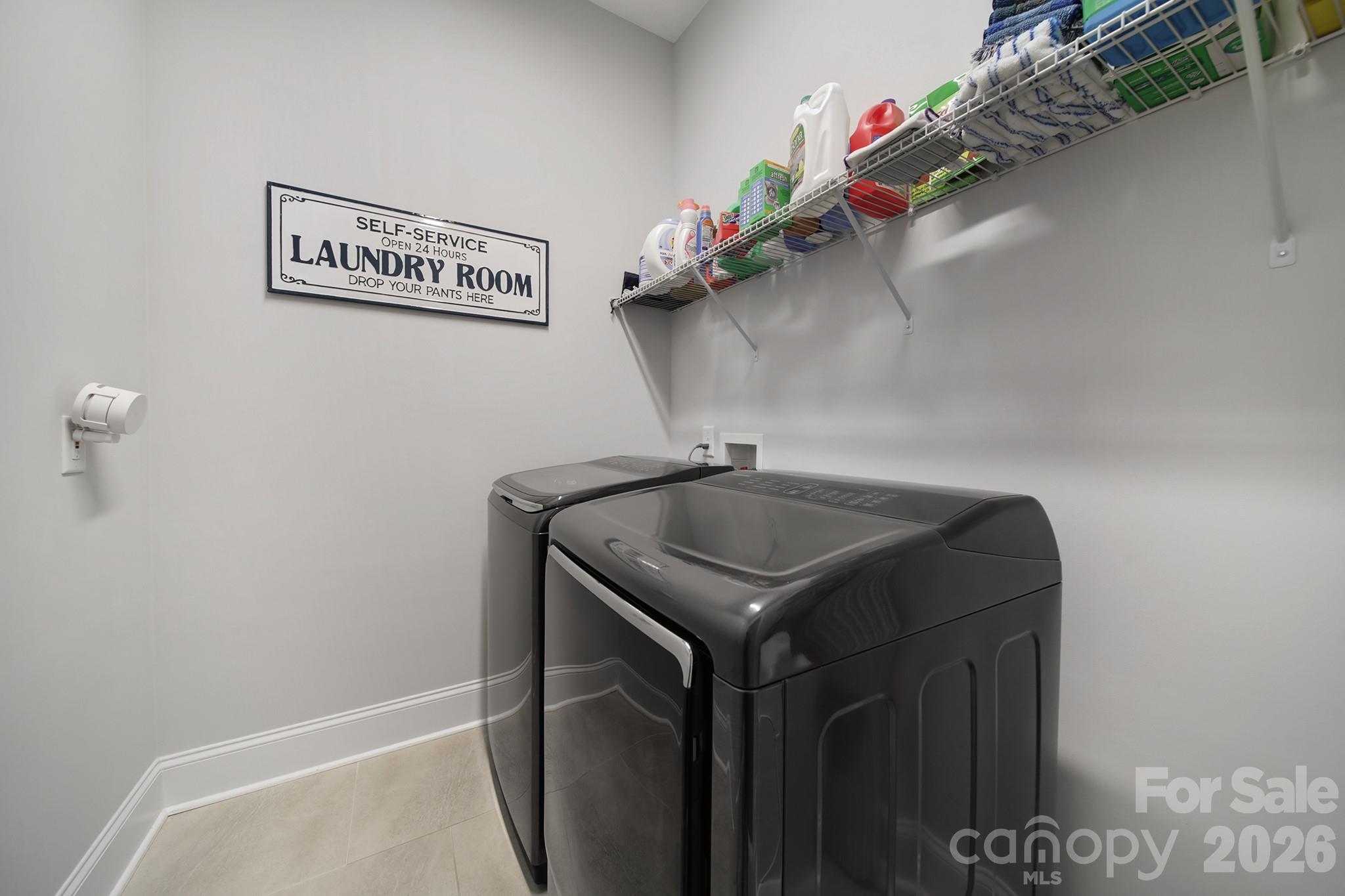 1633 Half Pint Loop Fort Mill, SC 29708 - Photo 16 of 48 a utility room with dryer and washer