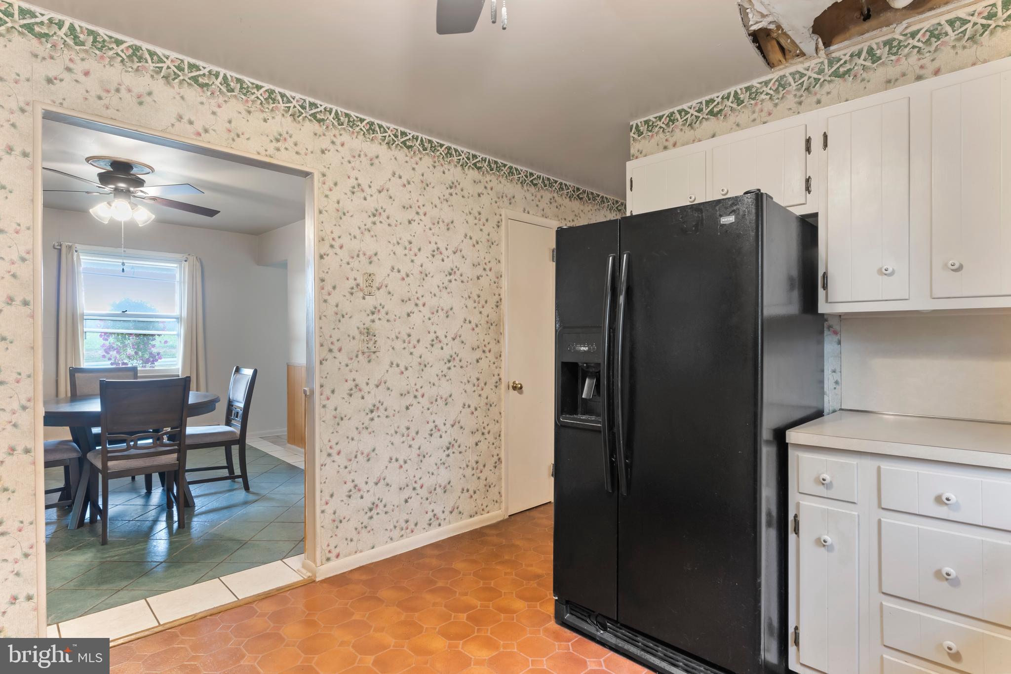 335 Wolfs Bridge Road Carlisle, PA 17013 - Photo 13 of 37 a kitchen with stainless steel appliances granite countertop a refrigerator and a stove top oven