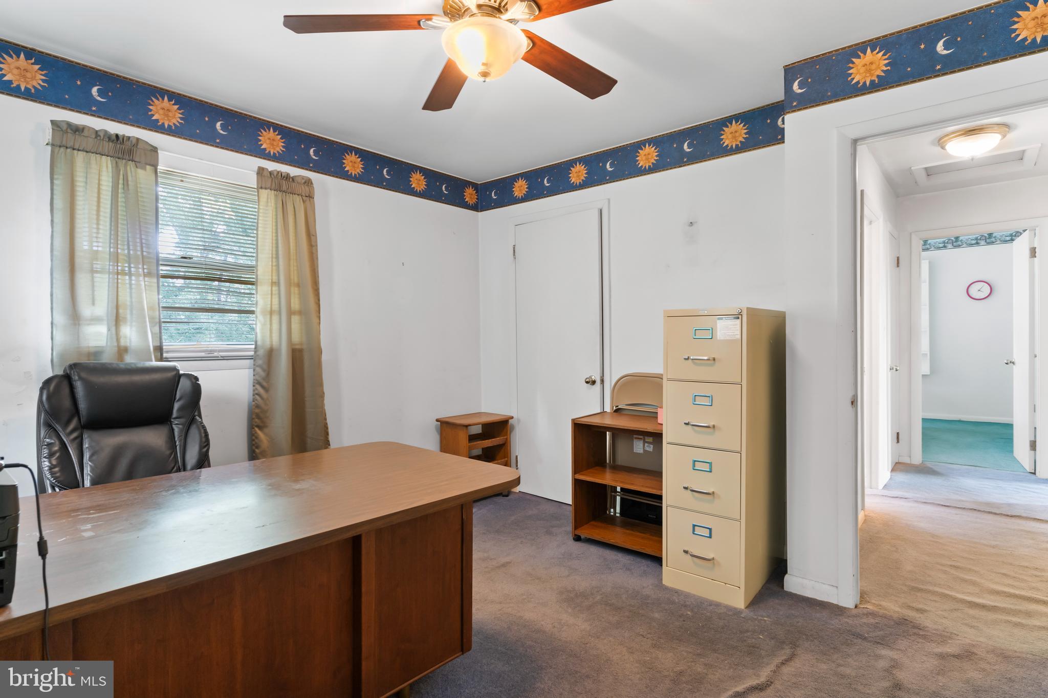 335 Wolfs Bridge Road Carlisle, PA 17013 - Photo 23 of 37 a view of a workspace with furniture and a window