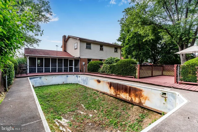 a view of a house with swimming pool