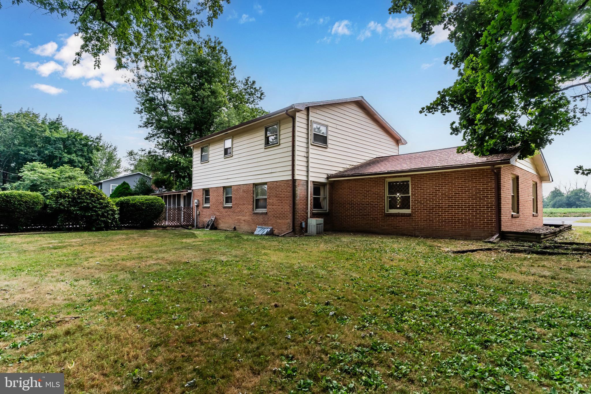 335 Wolfs Bridge Road Carlisle, PA 17013 - Photo 34 of 37 a view of a backyard with a garden