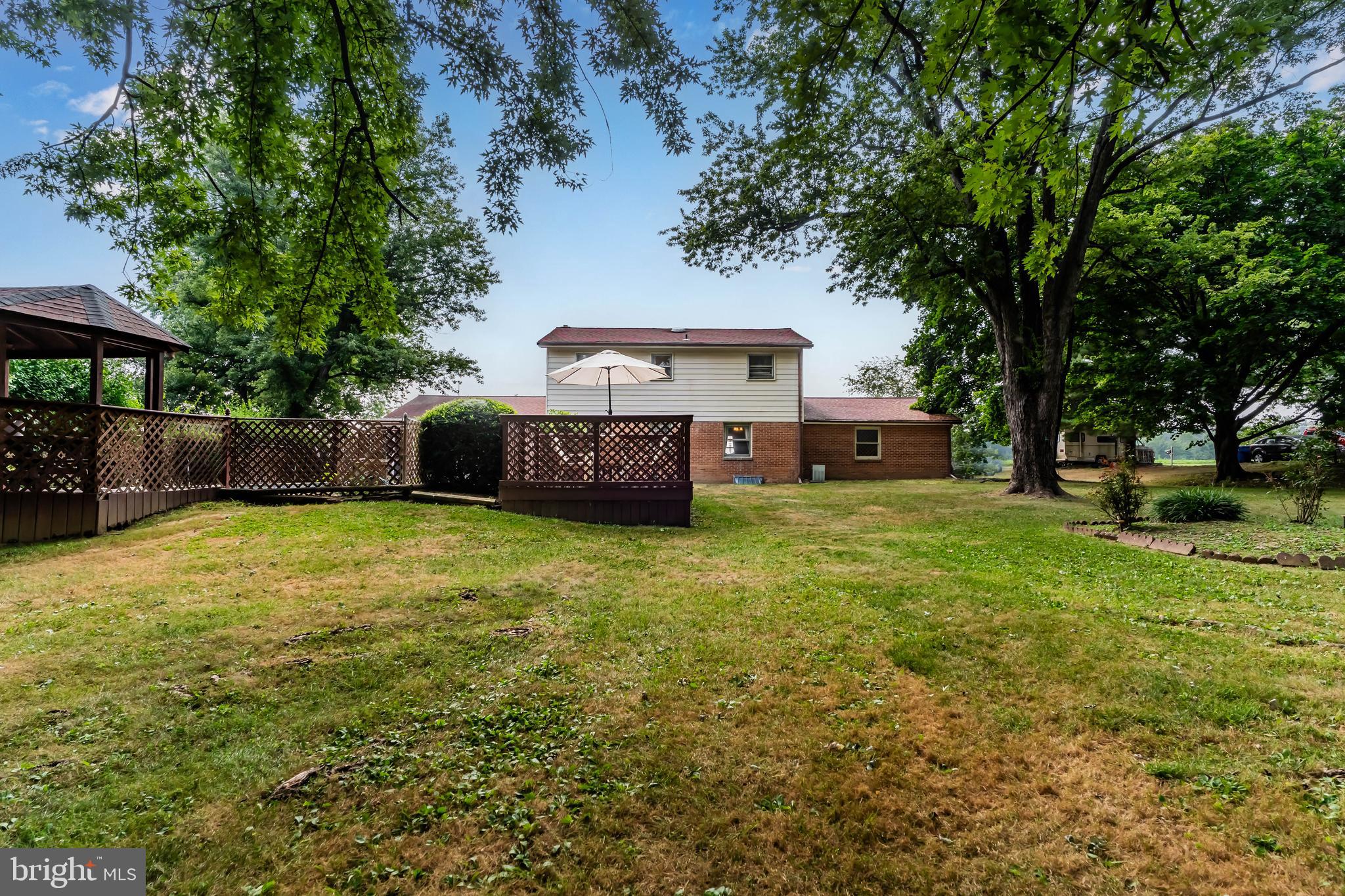 335 Wolfs Bridge Road Carlisle, PA 17013 - Photo 35 of 37 a front view of a house with a yard
