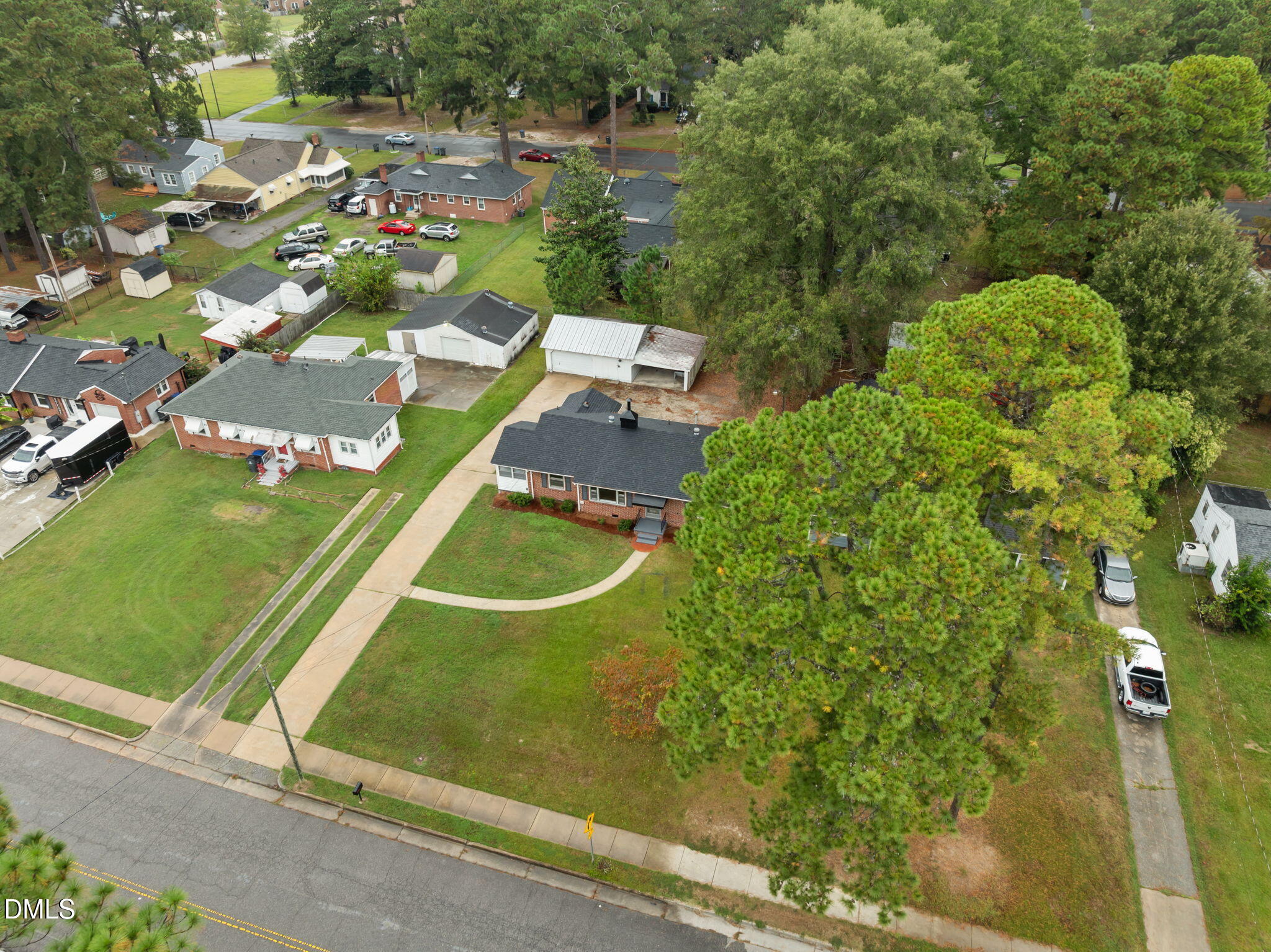 1220 Tarboro Street Rocky Mount, NC 27801 - Photo 10 of 47 an aerial view of a residential houses with outdoor space and street view