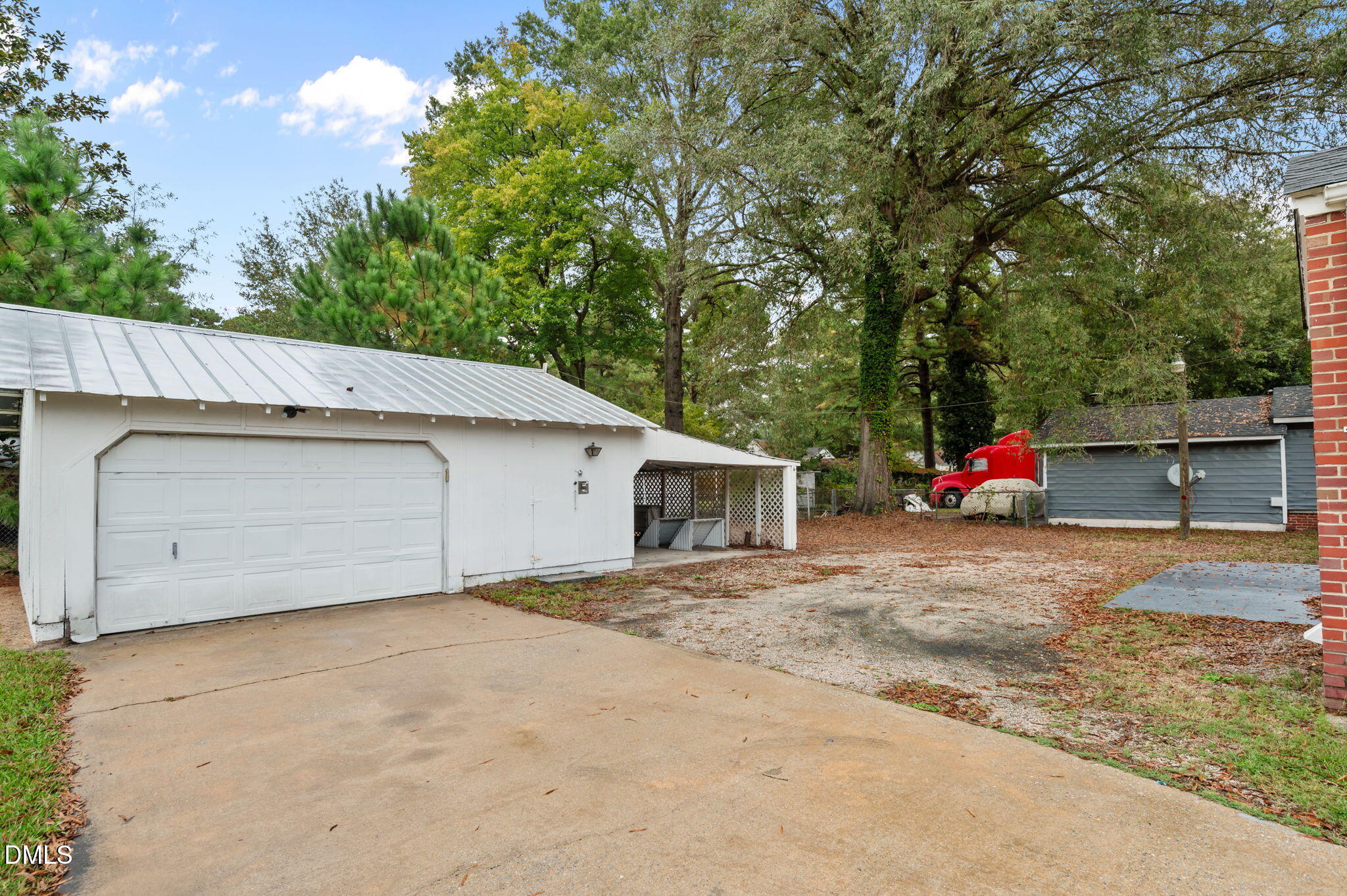 1220 Tarboro Street Rocky Mount, NC 27801 - Photo 41 of 47 a backyard of a house with portable swimming pool and outdoor space