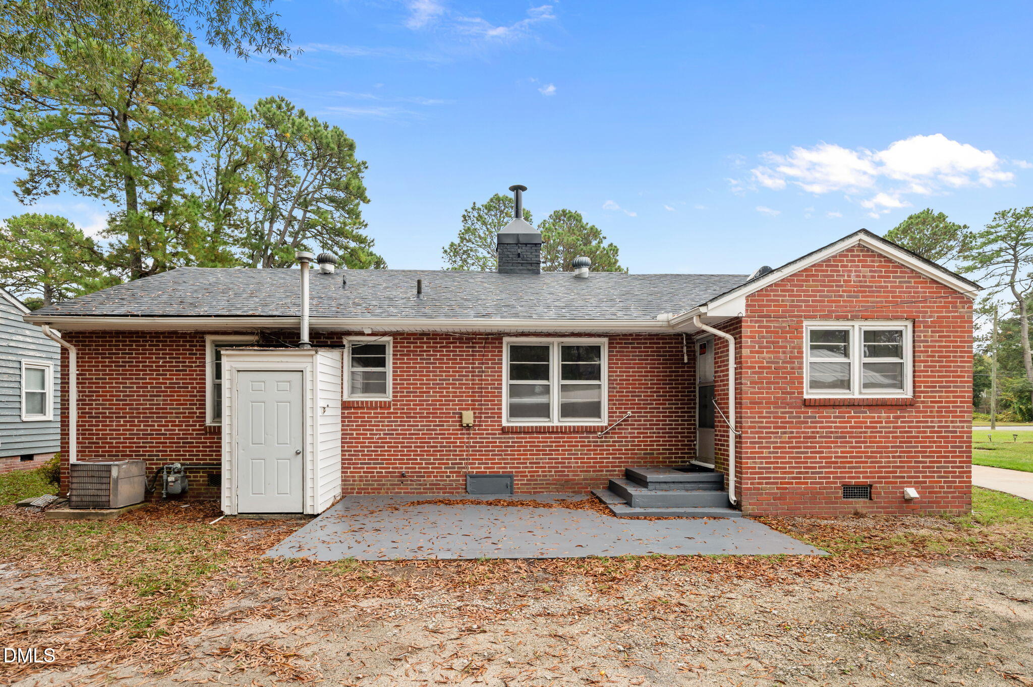 1220 Tarboro Street Rocky Mount, NC 27801 - Photo 42 of 47 a front view of a house with a yard