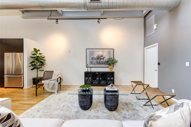 a view of a living room and dining room