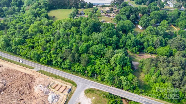 a view of a forest from a balcony