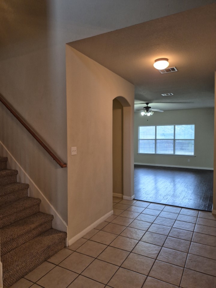 808 Busleigh Castle Way Pflugerville, TX 78660 - Photo 4 of 31 A view into the home from the foyer