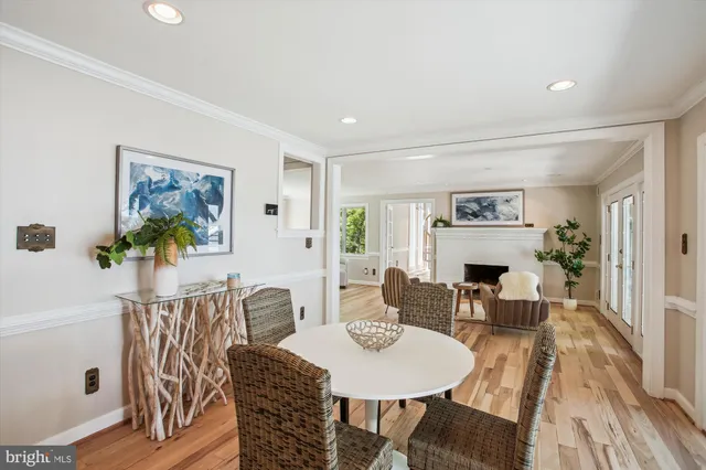 a bathroom with a sink mirror and toilet