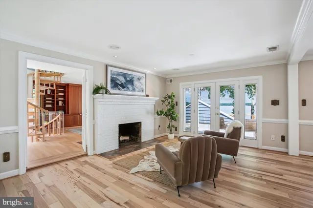 a bed room with a bed and a large window