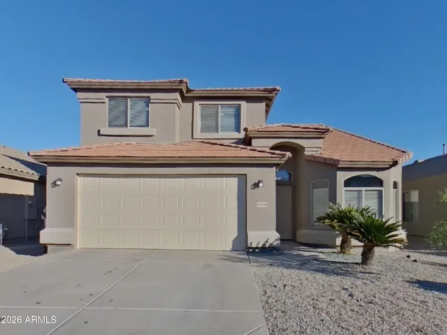 a view of a house with a patio