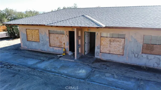a view of a balcony with chairs