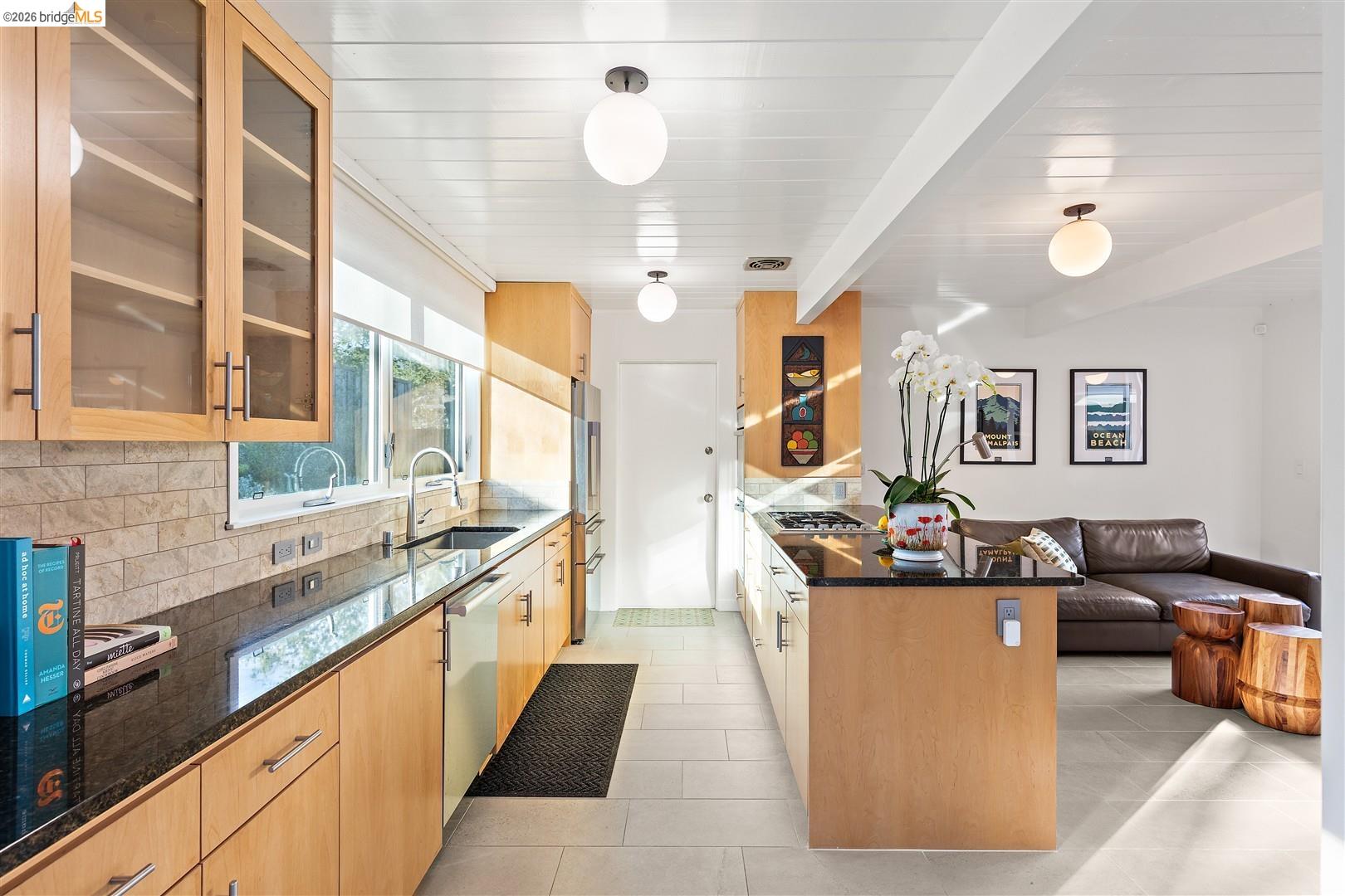 841 Montecillo Road San Rafael, CA 94903 - Photo 14 of 49 a kitchen with stainless steel appliances granite countertop a stove and a sink