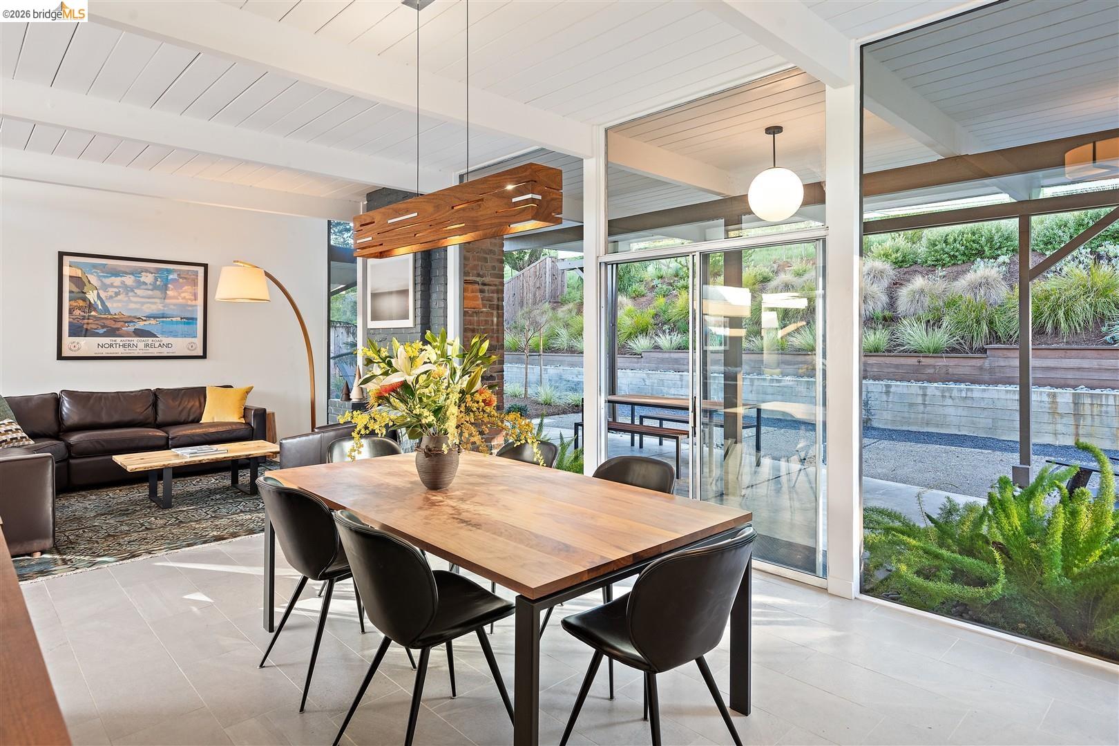 841 Montecillo Road San Rafael, CA 94903 - Photo 19 of 49 a view of a dining room with furniture window and outside view