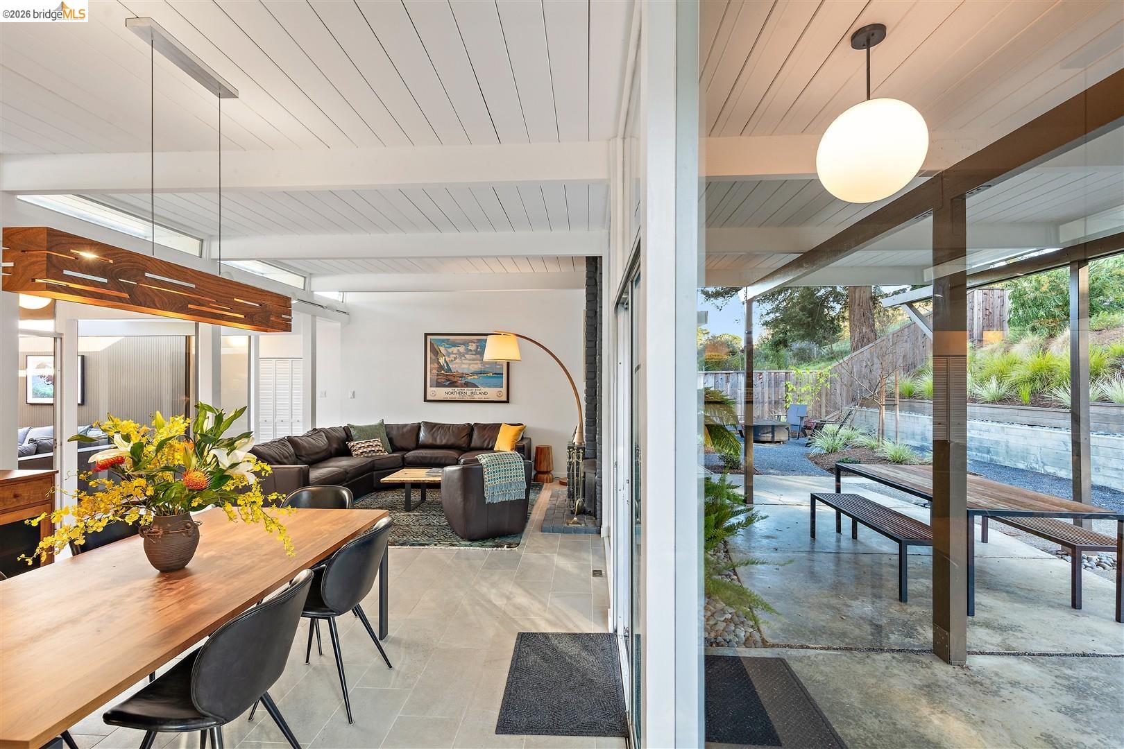 841 Montecillo Road San Rafael, CA 94903 - Photo 21 of 49 a living room with furniture and a large window