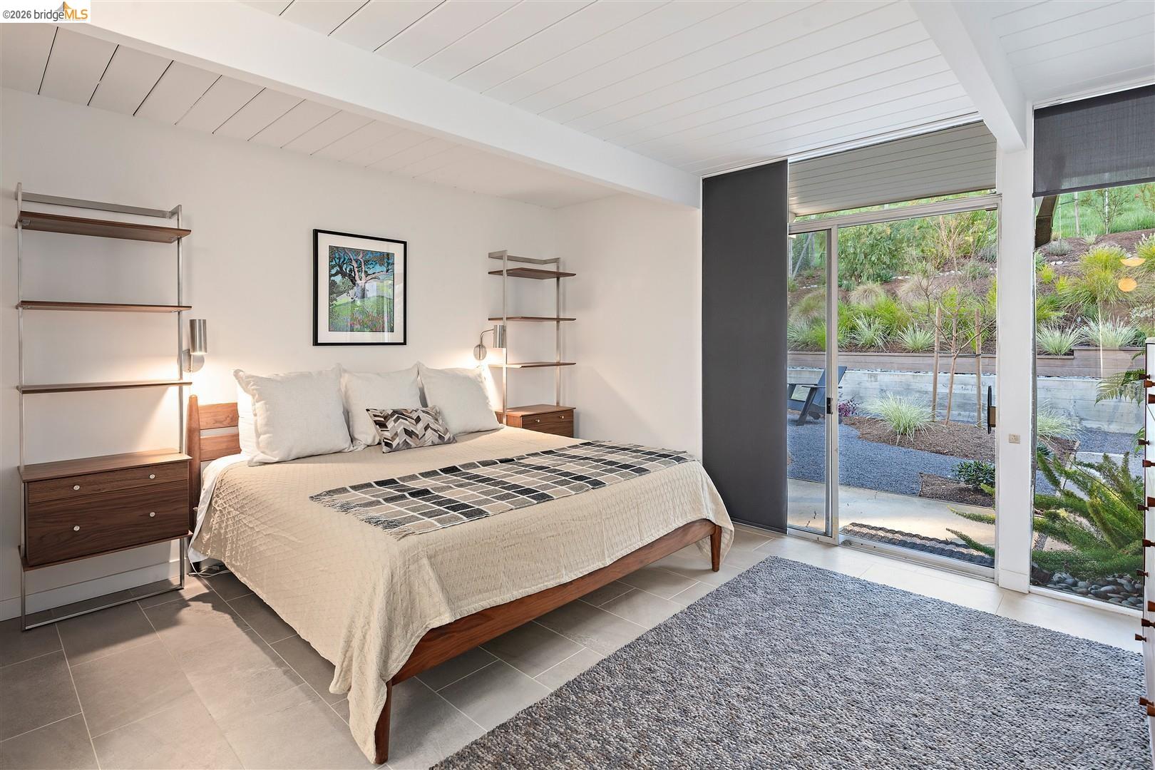 841 Montecillo Road San Rafael, CA 94903 - Photo 22 of 49 a bedroom with a bed and a night stand