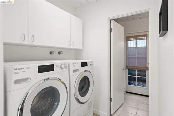 a view of swimming pool with outdoor seating