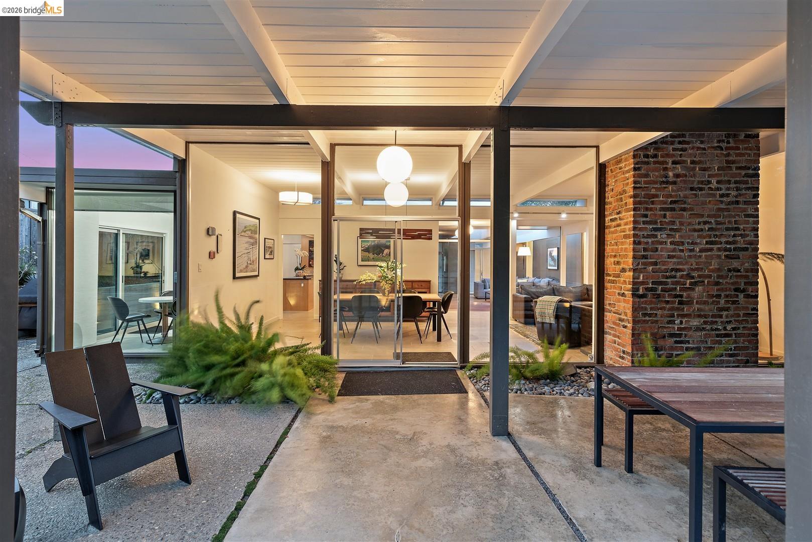 841 Montecillo Road San Rafael, CA 94903 - Photo 35 of 49 a porch with a table and chairs