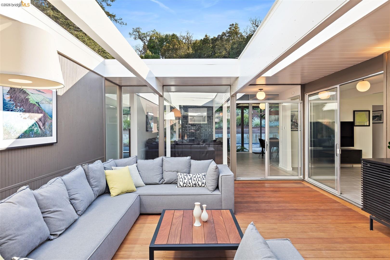 841 Montecillo Road San Rafael, CA 94903 - Photo 8 of 49 a living room with furniture and a large window
